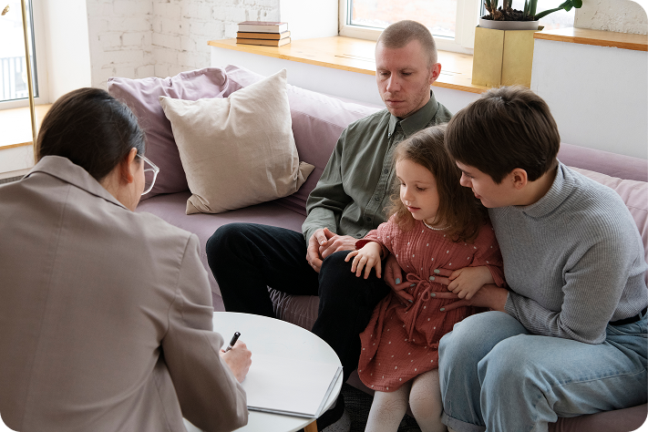 Parent and child working together on therapy activities